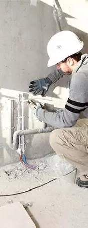 plumber installing new pipes